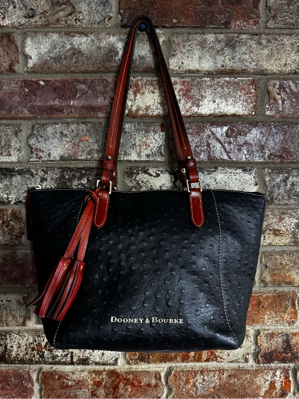 Dooney & Bourke Black Tote with Brown Handles and Tassel